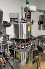 Used Used Sancoa rotary labeler. model# PRL 1500R-S10, 10 station, right hand label head, dual label unwind stand, Industrial Dynamic Lastec laser coder with vision system, onboard side serter head, ...
