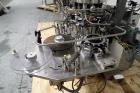 Used Used Sancoa rotary labeler. model# PRL 1500R-S10, 10 station, right hand label head, dual label unwind stand, Industrial Dynamic Lastec laser coder with vision system, onboard side serter head, ...