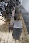 Used Used Sancoa rotary labeler. model# PRL 1500R-S10, 10 station, right hand label head, dual label unwind stand, Industrial Dynamic Lastec laser coder with vision system, onboard side serter head, ...