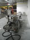 Used-Used New Jersey wrap around labeler, model 334RSTP, speeds up to 400 units/minute, trunion roll bottle handling system,...