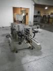 Used-Used New Jersey wrap around labeler, model 334RSTP, speeds up to 400 units/minute, trunion roll bottle handling system,...