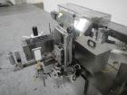 Used-Used New Jersey wrap around labeler, model 334RSTP, speeds up to 400 units/minute, trunion roll bottle handling system,...