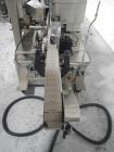 Used-Used New Jersey wrap around labeler, model 334RSTP, speeds up to 400 units/minute, trunion roll bottle handling system,...