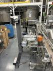 Universal Labeling Systems Pressure Senitive Wraparound Labeler