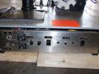 Used Avery 6101 Pressure Sensitive Spot or Wraparound Labeler, Model 6101-3-RH. Bench or tabletop labeler design, has hot stamp date coder, star wheel bottle indexing and 4
