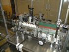 Used Libra Pharmaceutical Technologies Pressure Sensitive Bottle Labeler, Model SENS 350. Designed to apply pressure sensitive labels on cylindrical containers of metal, glass, or plastic. Maximum ou...