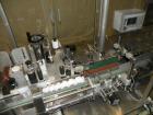 Used Libra Pharmaceutical Technologies Pressure Sensitive Bottle Labeler, Model SENS 350. Designed to apply pressure sensitive labels on cylindrical containers of metal, glass, or plastic. Maximum ou...