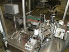 Used Libra Pharmaceutical Technologies Pressure Sensitive Bottle Labeler, Model SENS 350. Designed to apply pressure sensitive labels on cylindrical containers of metal, glass, or plastic. Maximum ou...