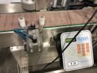 Used Ketan LS3PW-W Three Panel and Round Product Labeling System.