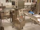 Used Kalish Labelstar Wraparound Pressure Sensitve Labeler, Model LS4000. Capable of speeds up to 150 cpm. Unit has Acuity PMC80 vision system, open date hot stamp coder bump wheel indexing, top hold...