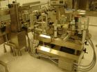 Used Kalish Labelstar Wraparound Pressure Sensitve Labeler, Model LS4000. Capable of speeds up to 150 cpm. Unit has Acuity PMC80 vision system, open date hot stamp coder bump wheel indexing, top hold...