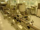 Used Kalish Labelstar Wraparound Pressure Sensitve Labeler, Model LS4000. Capable of speeds up to 150 cpm. Unit has Acuity PMC80 vision system, open date hot stamp coder bump wheel indexing, top hold...