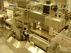 Used Kalish Labelstar Wraparound Pressure Sensitve Labeler, Model LS4000. Capable of speeds up to 150 cpm. Unit has Acuity PMC80 vision system, open date hot stamp coder bump wheel indexing, top hold...