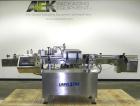 Used Kalish Labelstar wraparound labeler with labeling head.