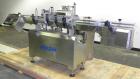 Used Kalish Labelstar wraparound labeler with labeling head.