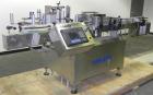 Used Kalish Labelstar wraparound labeler with labeling head.