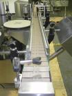Used Kalish Labelstar wraparound labeler with labeling head.