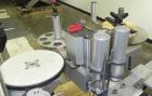 Used Kalish Labelstar wraparound labeler with labeling head.