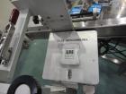 Used Newman NV2 (NVII) Automatic Pressure Sensitive Labeler. Capable of speeds up to 150 containers per minute. Has a label size range: 10mm to 150mm. Model NV11, Serial #95234. Features single head ...