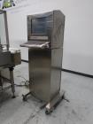 Used Neri Pressure Sensitive Trunion Wraparound Vial/Ampoule Labeler