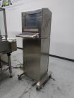 Used- Neri Pressure Sensitive Trunion Wraparound Vial/Ampoule Labeler