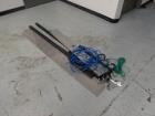 Used Neri Pressure Sensitive Trunion Wraparound Vial/Ampoule Labeler