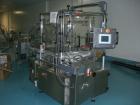 Used Newman Model VAL550 Labeller. Approximate maximum output 600 cpm. Includes PCE control system and in / out conveyors. Container size range: (Diameter) 8mm - 50mm. Label size range: (Height) 12mm...