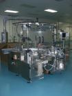 Used Newman Model VAL550 Labeller. Approximate maximum output 600 cpm. Includes PCE control system and in / out conveyors. Container size range: (Diameter) 8mm - 50mm. Label size range: (Height) 12mm...