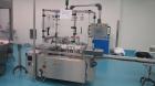 Used Newman Model VAL550 Labeller. Approximate maximum output 600 cpm. Includes PCE control system and in / out conveyors. Container size range: (Diameter) 8mm - 50mm. Label size range: (Height) 12mm...