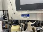 Usado: etiquetadora rotativa sensible a la presión automática P.E. Master con registro de contenedores. Tiene cabezales redu...