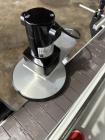 Quadrel Model Econoline 4 Panel Wrap Pressure Sensitive wrap labeler.