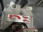 Used Quadrel model Q60 Wraparound Pressure Sensitive Labeler with Norwood Hot Stamp Coder. Has a 7