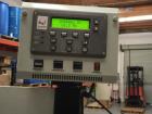 Used Quadrel model Q60 Wraparound Pressure Sensitive Labeler with Norwood Hot Stamp Coder. Has a 7