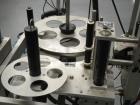 Used Quadrel model Q60 Wraparound Pressure Sensitive Labeler with Norwood Hot Stamp Coder. Has a 7