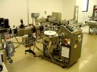 Used Sancoa Outsert Application Machine, Model OP-2000, with single label head, serial #3778.