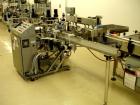 Used Sancoa Outsert Application Machine, Model OP-2000, with single label head, serial #3778.