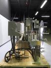 Used Weiler Labeling Systems (Sancoa) Model PRL-2000-S10 Rotary Pressure Sensitive Labeler. 10 Head unit designed to run front and back and wrap applications. Originally ran from 7 ml - 30 ml round b...