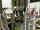 Used Weiler Labeling Systems (Sancoa) Model PRL-2000-S10 Rotary Pressure Sensitive Labeler. 10 Head unit designed to run front and back and wrap applications. Originally ran from 7 ml - 30 ml round b...