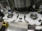 Used Weiler Labeling Systems (Sancoa) Model PRL-2000-S10 Rotary Pressure Sensitive Labeler. 10 Head unit designed to run front and back and wrap applications. Originally ran from 7 ml - 30 ml round b...