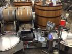 Used Tronics Model S30 Series 3 Pressure Sensitive Wraparound Labeler.