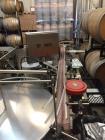 Used Tronics Model S30 Series 3 Pressure Sensitive Wraparound Labeler.