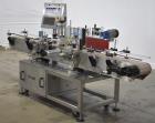 Tronics Model S3 stainless steel pressure sensitive wrap labeler