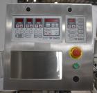 Tronics Model S3 stainless steel pressure sensitive wrap labeler