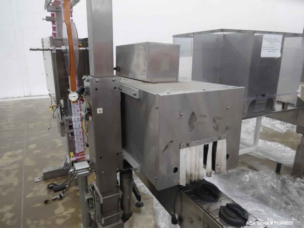 Used Axon Corporation EZ-100 Tamper Evident Band and Sleeve Label Applicator