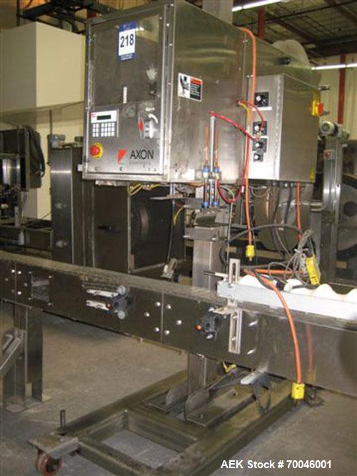 Used Axon "Styrotech" Sleeve Labeler or Tamper Evident Band Applicator, EZ-200 Series, Serial# E0201106. Machine is a single head design and can perform at up to 120 containers per minute. This machi...