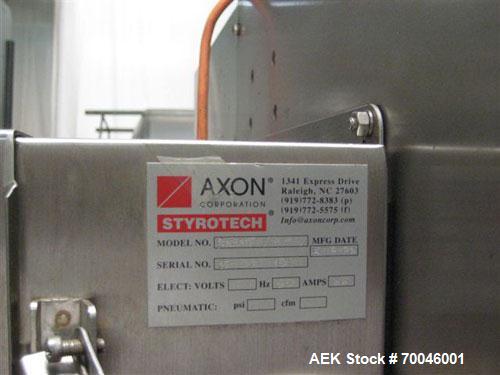 Used Axon "Styrotech" Sleeve Labeler or Tamper Evident Band Applicator, EZ-200 Series, Serial# E0201106. Machine is a single head design and can perform at up to 120 containers per minute. This machi...