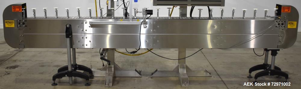 Used Axon Styrotech EZ-Seal EZ-200 Single Head Tamper Evident Neck Bander. Designed to run up to 120 containers per minute. 1-60/115 volt, 10 amp, serial # T-100210B, built 05/2010. Includes a heat s...