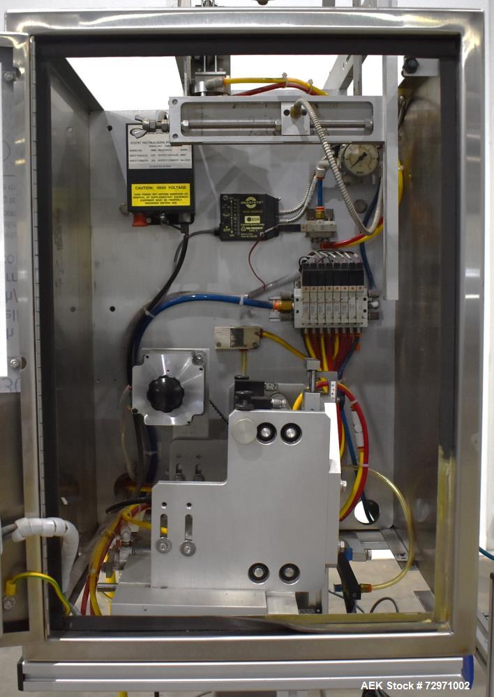 Used Axon Styrotech EZ-Seal EZ-200 Single Head Tamper Evident Neck Bander. Designed to run up to 120 containers per minute. 1-60/115 volt, 10 amp, serial # T-100210B, built 05/2010. Includes a heat s...