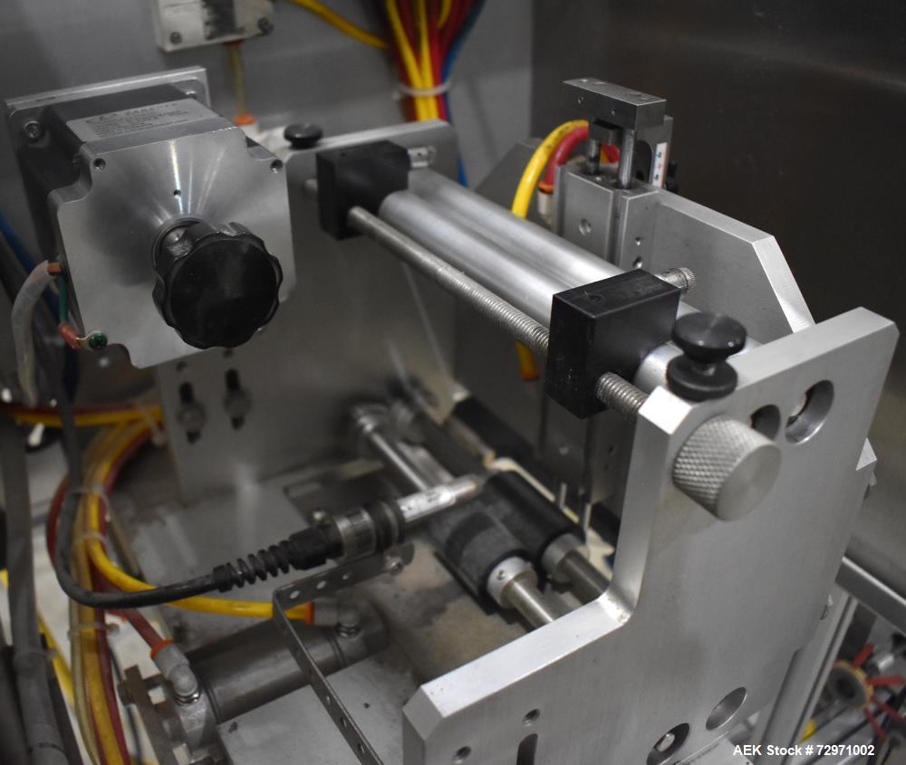 Used Axon Styrotech EZ-Seal EZ-200 Single Head Tamper Evident Neck Bander. Designed to run up to 120 containers per minute. 1-60/115 volt, 10 amp, serial # T-100210B, built 05/2010. Includes a heat s...