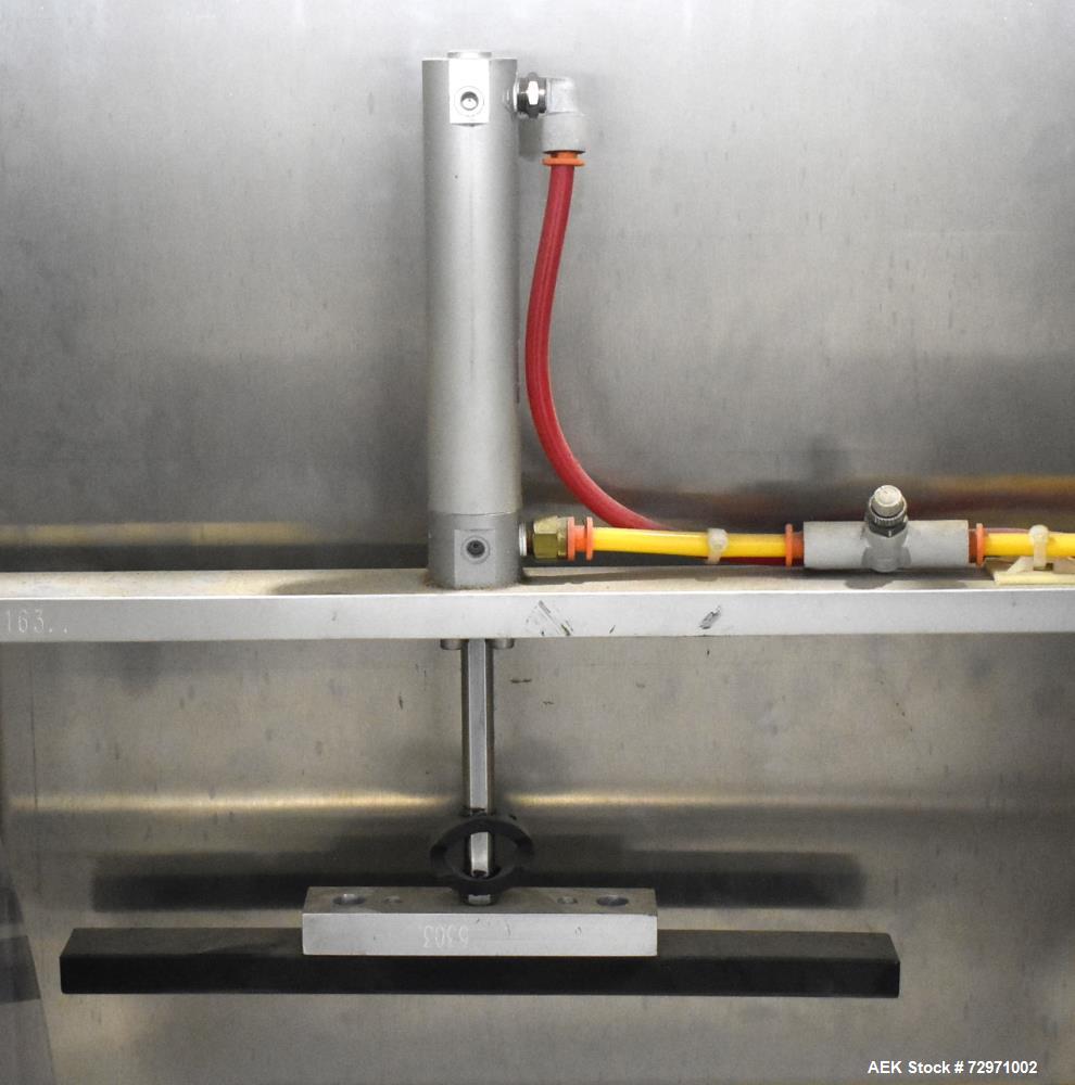 Used Axon Styrotech EZ-Seal EZ-200 Single Head Tamper Evident Neck Bander. Designed to run up to 120 containers per minute. 1-60/115 volt, 10 amp, serial # T-100210B, built 05/2010. Includes a heat s...
